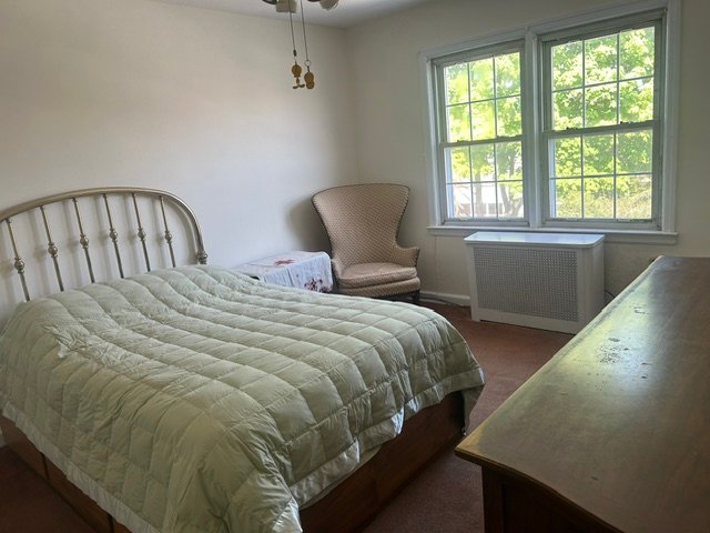 
            Second finished bedroom after
            professional organizing